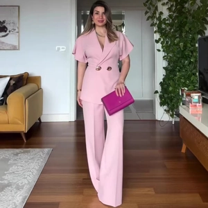 Elegant pink two-piece suit with double-breasted blazer top and wide-leg trousers