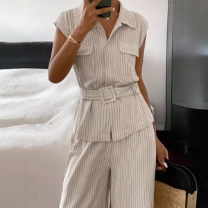 Women's sleeveless striped two-piece set with lapel shirt, belted waist and wide-leg pants