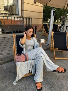 Chic grey three-piece lounge set with long cardigan and high-waisted wide trousers