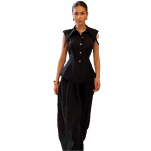 Women's black two-piece set with sleeveless buttoned top and wide-leg trousers
