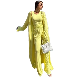 Three-piece lounge set with long cardigan, tank top, and wide-leg pants in lemon yellow