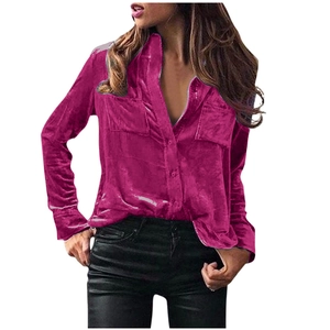 Detailed view of women's long sleeve shirt in magenta with dual chest flap pockets