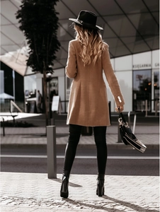 Detailed back view of a slim-fit camel wool coat with elegant buttoned cuffs on the sleeves