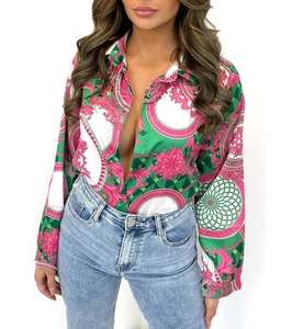 Detailed view of long sleeve satin shirt with baroque print in pink and green color