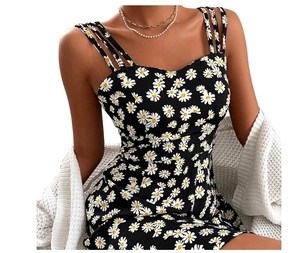 Detail of black summer dress with daisy print and multi-strap neckline design