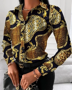Detail of baroque chain and leopard print pattern on smooth long-sleeve silk-like shirt