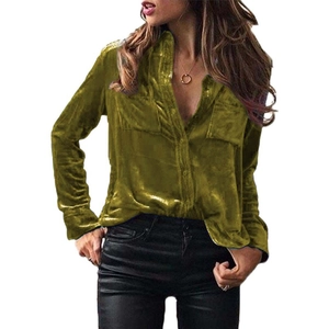 Close-up of olive green velvet long sleeve shirt with front pockets and buttons