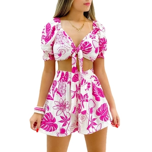 Summer two-piece set featuring tropical floral V-neck tie-front top and high waist shorts