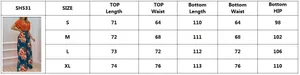 Tableau des tailles détaillé pour ensemble femme haut imprimé et pantalon large, tailles S-XL