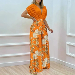 Ensemble d'été femme haut en satin orange à col en V et pantalon large à fleurs