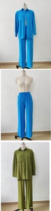 Detail of loose-fit shirt and high-waisted wide-leg pants in textured fabric