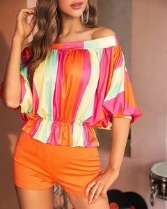 Detail of colorful striped off-shoulder blouse with elastic waist and puff sleeves