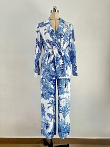 Detail of blue and white tropical jungle animal print on women long sleeve two-piece set