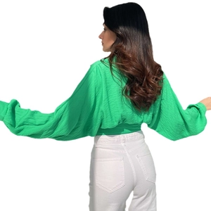 Green puff sleeve cropped shirt with textured fabric and tie-waist back view