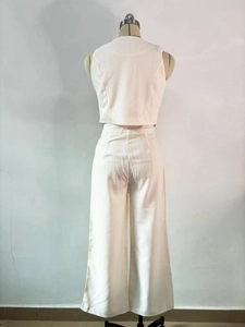 Rear view of ivory sleeveless vest and high-waist wide-leg trousers set on mannequin