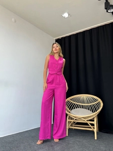 Chic rose red two-piece set featuring a V-neck buttoned vest and wide-leg trousers