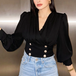 Women's black V-neck long sleeve blouse with puffed shoulders and gold buttons
