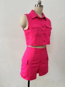 Detail of rose pink sleeveless utility top and high-waist cargo shorts set with large pockets