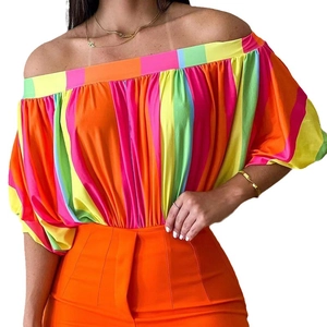 Women's off-shoulder striped summer top with puff sleeves and high-waist orange wide-leg pants