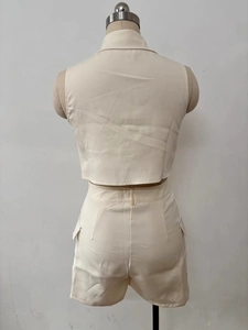 Back view of cream two-piece sleeveless vest and cargo shorts set with wrinkled texture