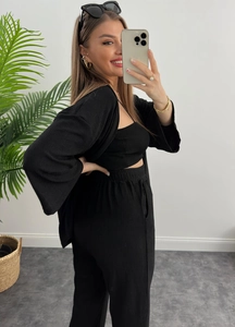 Completo nero a 3 pezzi in maglia a coste con cardigan, top a fascia e pantaloni a vita alta