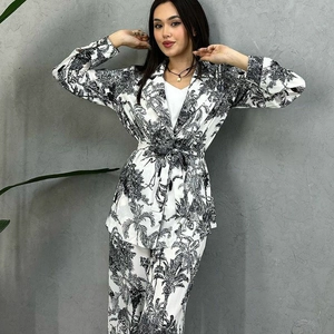 Women's 2-piece lounge set featuring tropical palm print long sleeve shirt and trousers