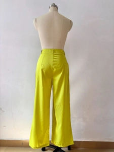 Detailed back view of high-waisted wide-leg trousers in vibrant neon green color
