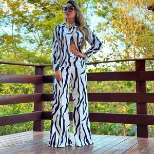 Women's black and white zebra print two-piece set with long sleeve shirt and wide leg pants