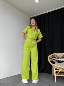 Bright green linen-style short-sleeved crop top and high-waisted wide-leg pants set