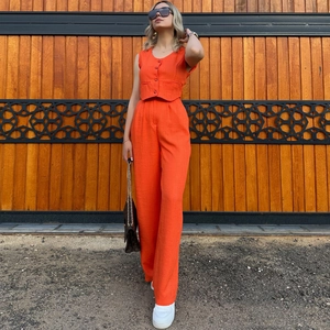 Women's summer orange two-piece set featuring a cropped vest and high-waist straight pants