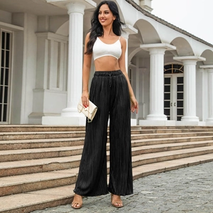 Elegant black pleated high-waisted wide-leg trousers with elastic waistband and drape