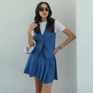 Women's blue suit vest and high waist pleated skirt two-piece set outfit