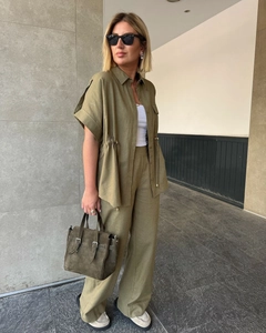 Detail of olive green lounge set featuring adjustable drawstring waist and linen texture
