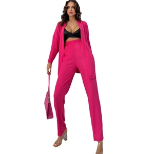 Chic women's two-piece casual set featuring a long hot pink cardigan and matching trousers