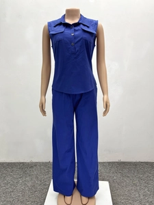 Detail view of navy blue sleeveless cargo vest and wide-leg pants set on mannequin
