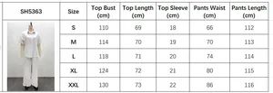 Detailed size chart for women's two-piece short sleeve shirt and long pants set in cm