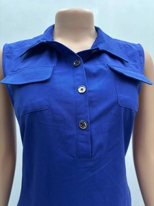 Close-up of royal blue sleeveless cargo vest with lapel collar and chest pockets