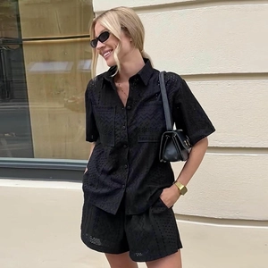 Women's two-piece black eyelet embroidery short sleeve shirt and shorts set for summer