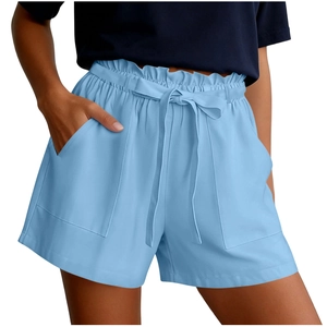 Detail of light blue high waisted paperbag shorts with adjustable belt and side pockets