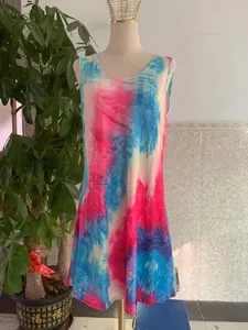 Detail of pink and blue tie-dye sleeveless dress with a scoop neck and casual side pockets