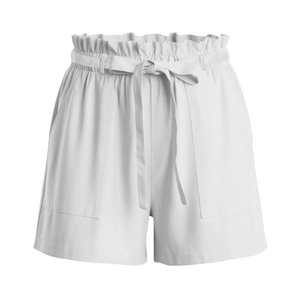 Detail of white cotton linen paperbag waist shorts with decorative bow and large pockets