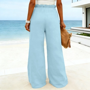 Detail back view of light blue wide leg linen pants with elastic paperbag waist design