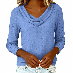 Detail of blue cowl neck top with hollow eyelet texture and knitted pattern