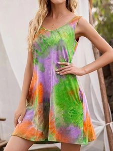 Detailed tie-dye print pattern and side pocket on a sleeveless summer beach dress
