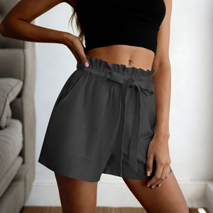 Close-up of women's charcoal grey paperbag waist shorts with tie belt and side pockets