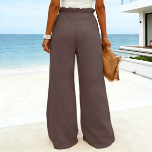 Rear view of brown cotton linen wide-leg pants featuring high-waisted design and loose fit
