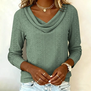 Detail of elegant cowl neck and textured lace knit fabric on a long-sleeve sage top