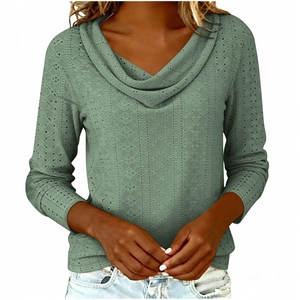 Macro detail of draped V-neckline and openwork knit texture on Morandi green long sleeve top