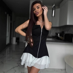 Robe moulante sans manches avec haut zippé noir et ourlet à volants en mousseline blanche