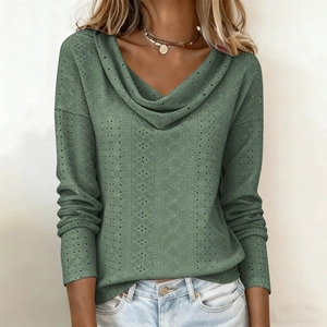Detail of sage green long sleeve top featuring V-neck cowl collar and knit hollow eyelets